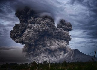 volcano eruption during daytime